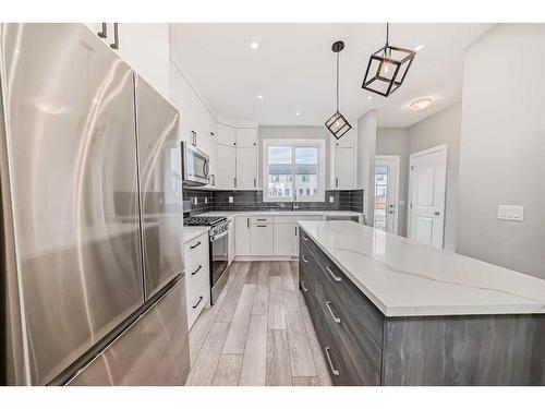 71 Amblefield Avenue, Calgary, AB - Indoor Photo Showing Kitchen With Double Sink