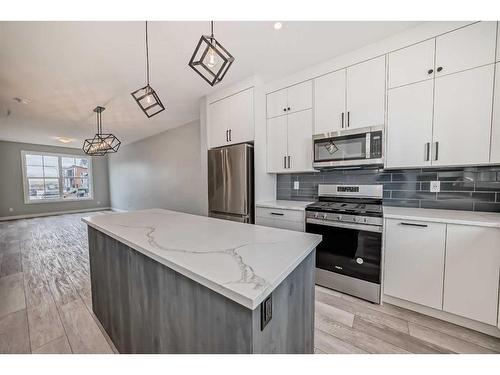 71 Amblefield Avenue, Calgary, AB - Indoor Photo Showing Kitchen With Upgraded Kitchen