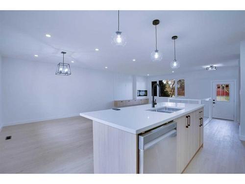 10911 Elbow Drive Sw, Calgary, AB - Indoor Photo Showing Kitchen With Double Sink With Upgraded Kitchen