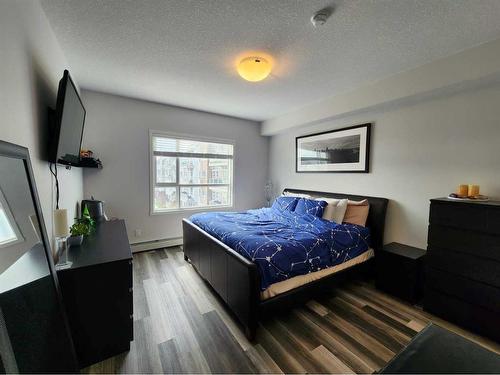 409-300 Harvest Hills Place Ne, Calgary, AB - Indoor Photo Showing Bedroom