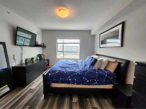 409-300 Harvest Hills Place Ne, Calgary, AB - Indoor Photo Showing Bedroom