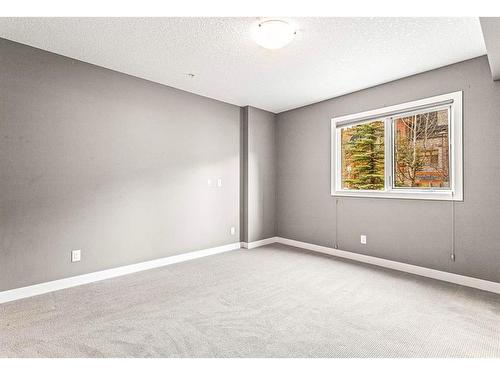 120-106 Stewart Creek Landing, Canmore, AB - Indoor Photo Showing Other Room