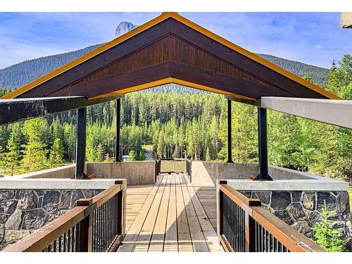 120-106 Stewart Creek Landing, Canmore, AB - Outdoor With Deck Patio Veranda With Exterior