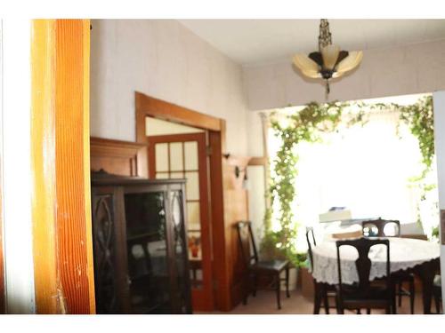412 Marten Street, Banff, AB - Indoor Photo Showing Dining Room