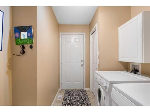 320 Cresthaven Place Sw, Calgary, AB - Indoor Photo Showing Laundry Room