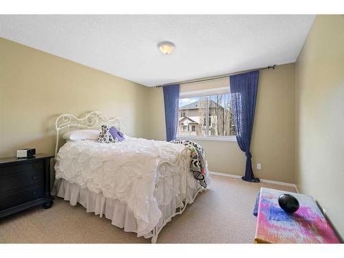 320 Cresthaven Place Sw, Calgary, AB - Indoor Photo Showing Bedroom