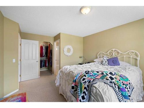 320 Cresthaven Place Sw, Calgary, AB - Indoor Photo Showing Bedroom