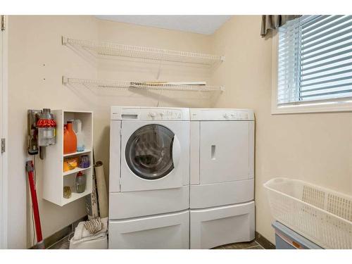 210 Valley Ridge Green Nw, Calgary, AB - Indoor Photo Showing Laundry Room