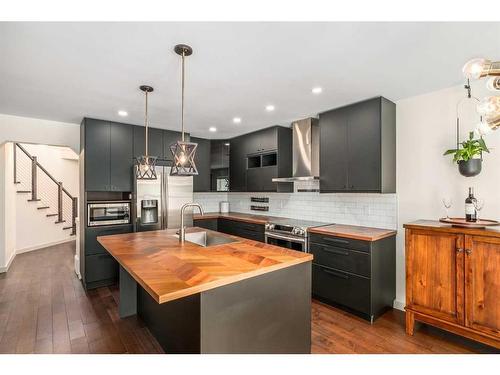 1077 Cranston Drive Se, Calgary, AB - Indoor Photo Showing Kitchen With Upgraded Kitchen