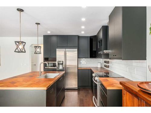1077 Cranston Drive Se, Calgary, AB - Indoor Photo Showing Kitchen With Stainless Steel Kitchen With Upgraded Kitchen