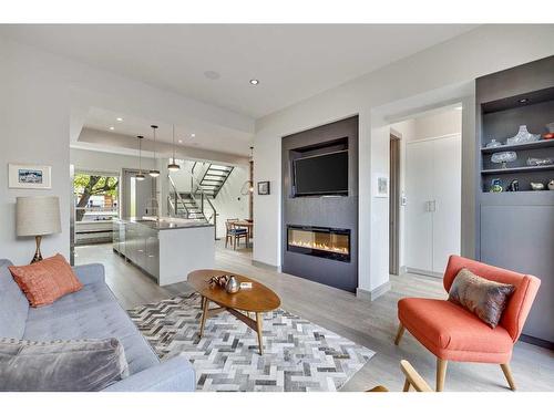 1823 William Street Se, Calgary, AB - Indoor Photo Showing Living Room With Fireplace