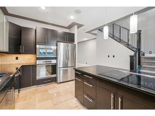 2427 52 Avenue Sw, Calgary, AB - Indoor Photo Showing Kitchen With Upgraded Kitchen