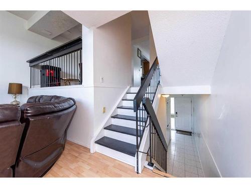 136 Glamis Terrace Sw, Calgary, AB - Indoor Photo Showing Other Room
