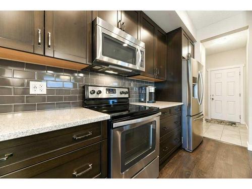 20 Mahogany Row Se, Calgary, AB - Indoor Photo Showing Kitchen With Stainless Steel Kitchen With Upgraded Kitchen