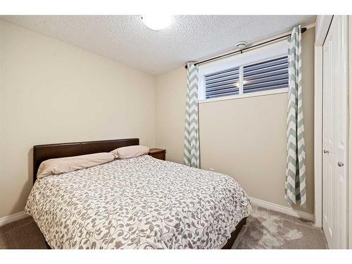 87 New Brighton Landing Se, Calgary, AB - Indoor Photo Showing Bedroom