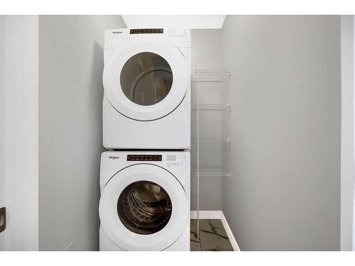 70 Mallard Heath Se, Calgary, AB - Indoor Photo Showing Laundry Room