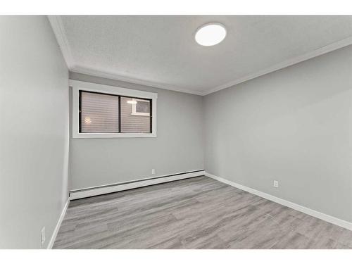 102-917 18 Avenue Sw, Calgary, AB - Indoor Photo Showing Other Room
