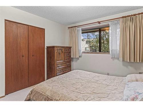 120 Beaver Street, Banff, AB - Indoor Photo Showing Bedroom