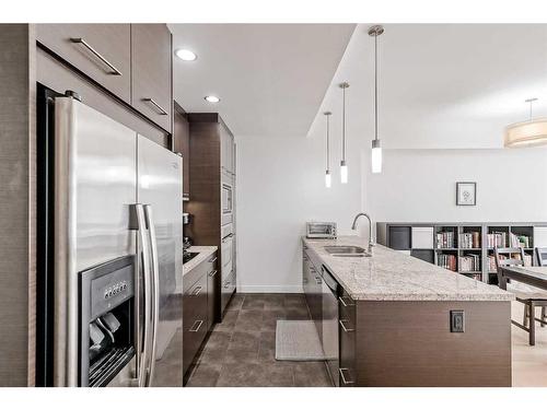 309-540 34 Street Nw, Calgary, AB - Indoor Photo Showing Kitchen With Upgraded Kitchen