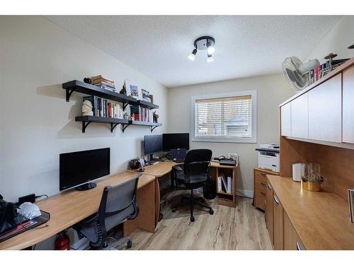 8 Canoe Road Sw, Airdrie, AB - Indoor Photo Showing Office