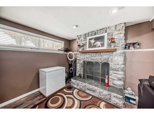 15 Coral Sands Place Ne, Calgary, AB - Indoor With Fireplace