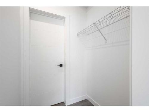 #134-2117 81 Street Sw, Calgary, AB - Indoor Photo Showing Laundry Room