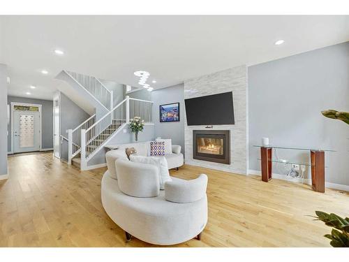 817 22 Avenue Nw, Calgary, AB - Indoor Photo Showing Living Room With Fireplace