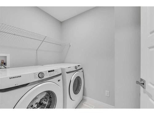 427 Lucas Boulevard Nw, Calgary, AB - Indoor Photo Showing Laundry Room