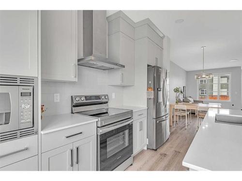 427 Lucas Boulevard Nw, Calgary, AB - Indoor Photo Showing Kitchen With Upgraded Kitchen