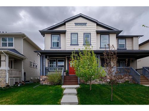 1080 Kings Heights Road Se, Airdrie, AB - Outdoor With Deck Patio Veranda With Facade