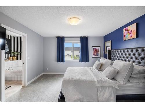 1080 Kings Heights Road Se, Airdrie, AB - Indoor Photo Showing Bedroom