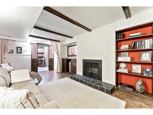 227 Martell Road Ne, Calgary, AB - Indoor Photo Showing Living Room With Fireplace