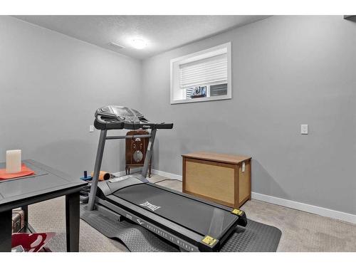 51 Sage Bank Court Nw, Calgary, AB - Indoor Photo Showing Gym Room
