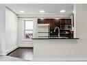 427-355 Taralake Way Ne, Calgary, AB  - Indoor Photo Showing Kitchen With Double Sink 