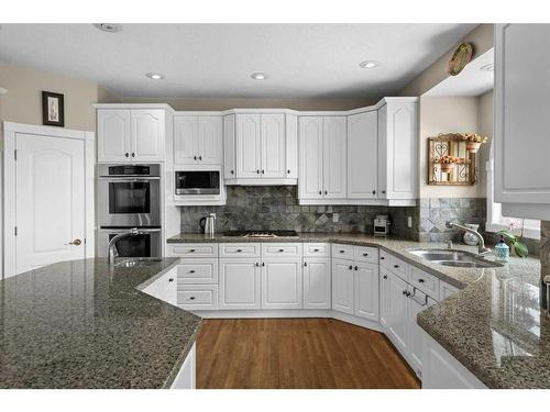216 Evergreen Heath Sw, Calgary, AB - Indoor Photo Showing Kitchen With Double Sink