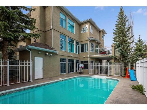 216 Evergreen Heath Sw, Calgary, AB - Outdoor With In Ground Pool With Exterior