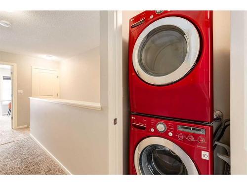 147 Ascot Point Sw, Calgary, AB - Indoor Photo Showing Laundry Room