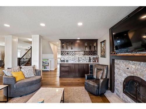 1416 Russell Road Ne, Calgary, AB - Indoor Photo Showing Living Room With Fireplace