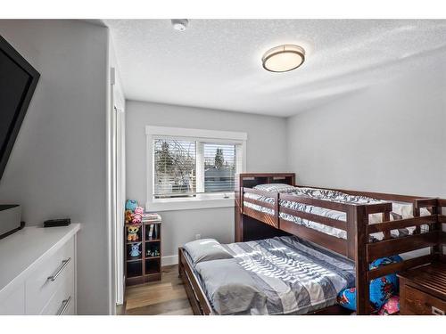 1416 Russell Road Ne, Calgary, AB - Indoor Photo Showing Bedroom