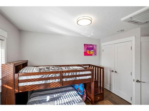 1416 Russell Road Ne, Calgary, AB - Indoor Photo Showing Bedroom