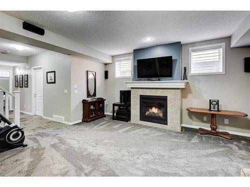 169 Auburn Crest Green Se, Calgary, AB - Indoor With Fireplace