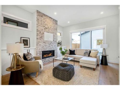 3112 14 Avenue Sw, Calgary, AB - Indoor Photo Showing Living Room With Fireplace