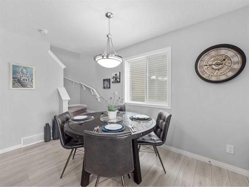 784 Osborne Drive Sw, Airdrie, AB - Indoor Photo Showing Dining Room