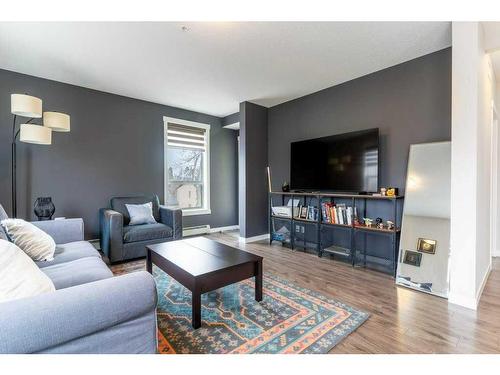 301-1740 9 Street Nw, Calgary, AB - Indoor Photo Showing Living Room