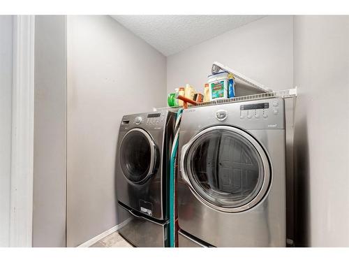 68 Prestwick Cove Se, Calgary, AB - Indoor Photo Showing Laundry Room