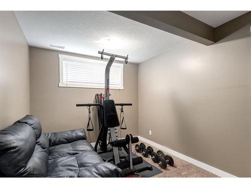68 Prestwick Cove Se, Calgary, AB - Indoor Photo Showing Gym Room