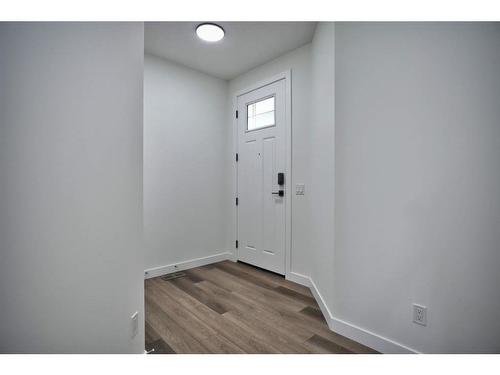 87 Hotchkiss Manor Se, Calgary, AB - Indoor Photo Showing Other Room