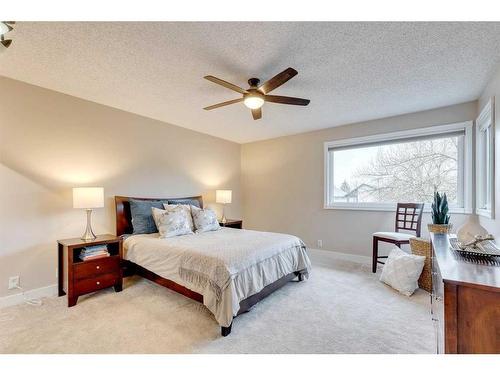 12 Strathcona Crescent Sw, Calgary, AB - Indoor Photo Showing Bedroom