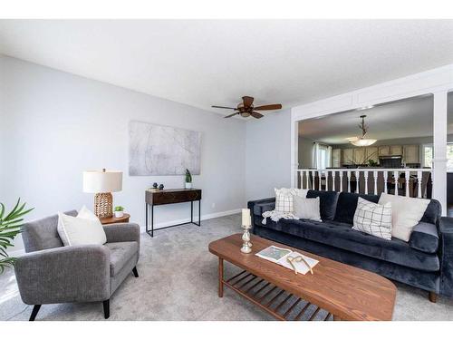 19 Dry Creek Bay, Airdrie, AB - Indoor Photo Showing Living Room