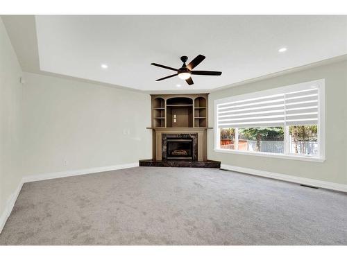 159 Schiller Crescent Nw, Calgary, AB - Indoor With Fireplace